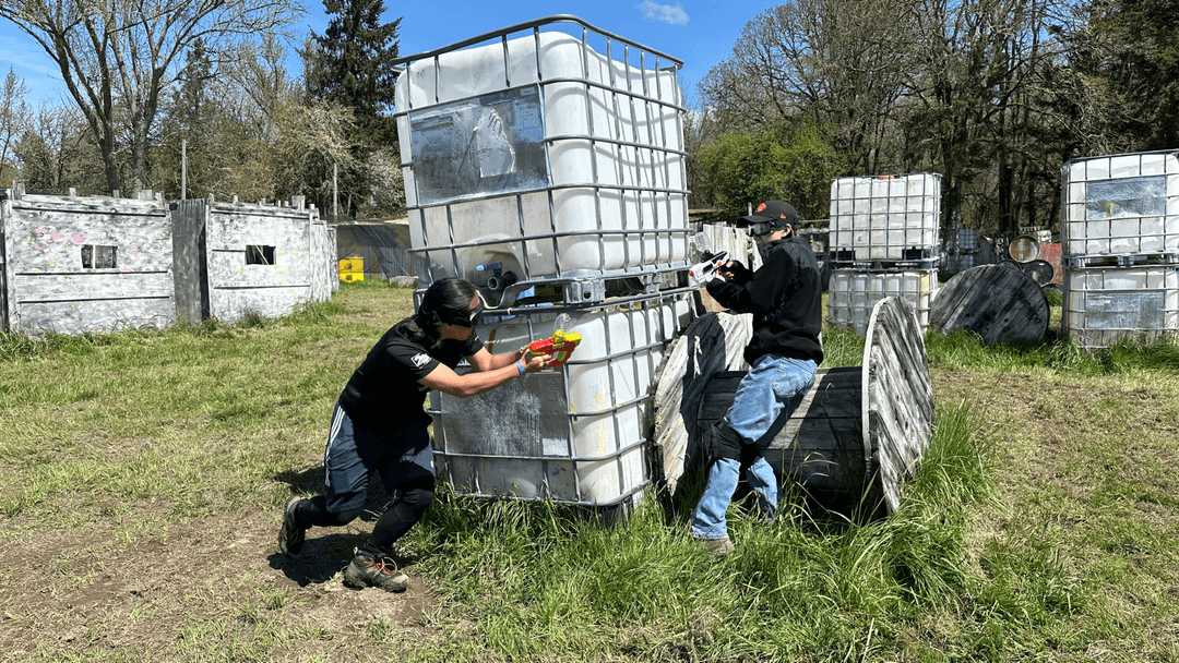 Orange Airsoft Club members celebrating a win on the field